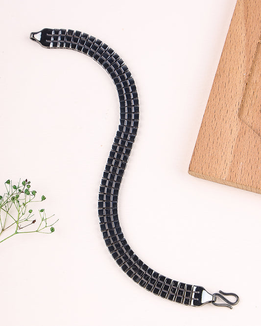 Black braided Bracelet on a white background