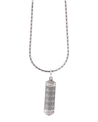 Silver pendant necklace with intricate design on a white background