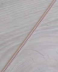 Close-up of Sterling Silver Bracelet on a textured white background