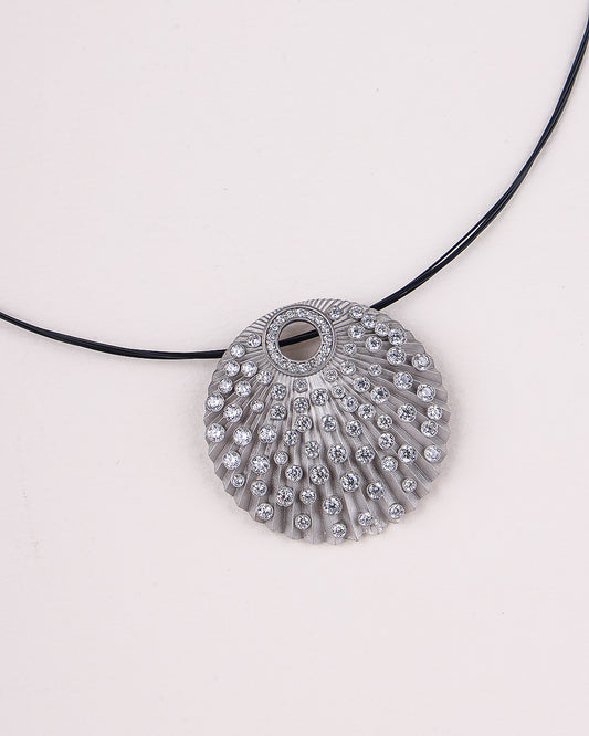 Silver pendant necklace on a white background