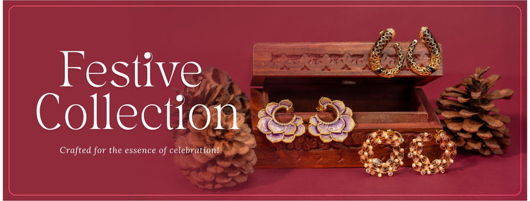 Jewelry set with pine cones and a chest on a red background, labeled 'Festive Collection'.
